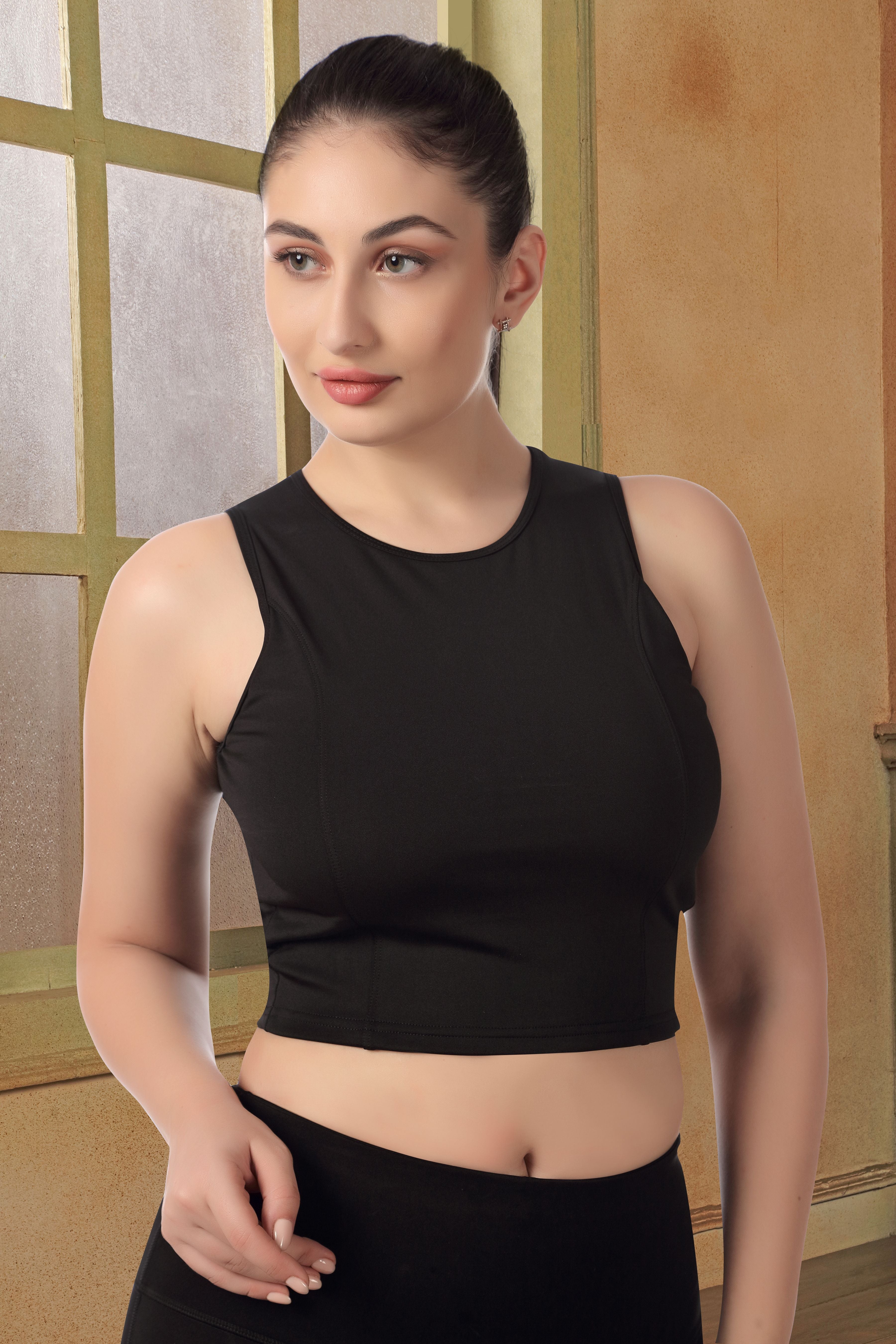 SLEEVELESS CT TOP
